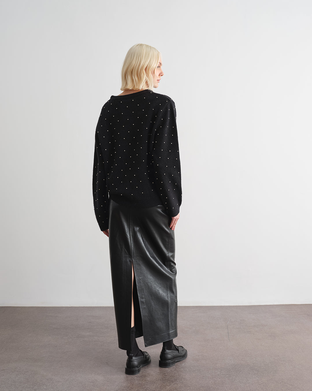 Maglione con applicazioni all over