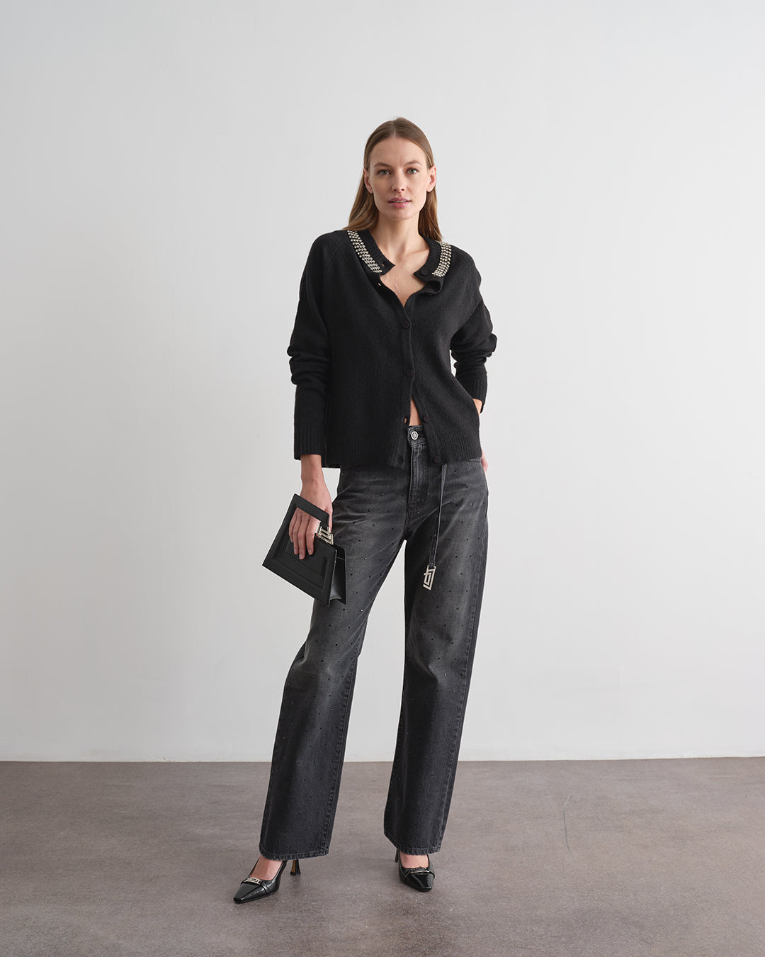 Pantalone in denim con strass all over