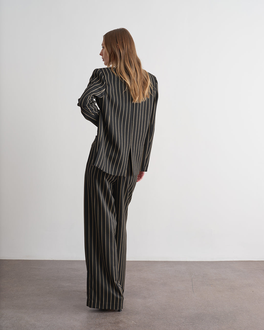 Pantalone gessato a palazzo