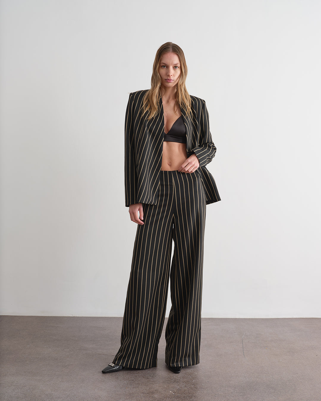 Pantalone gessato a palazzo