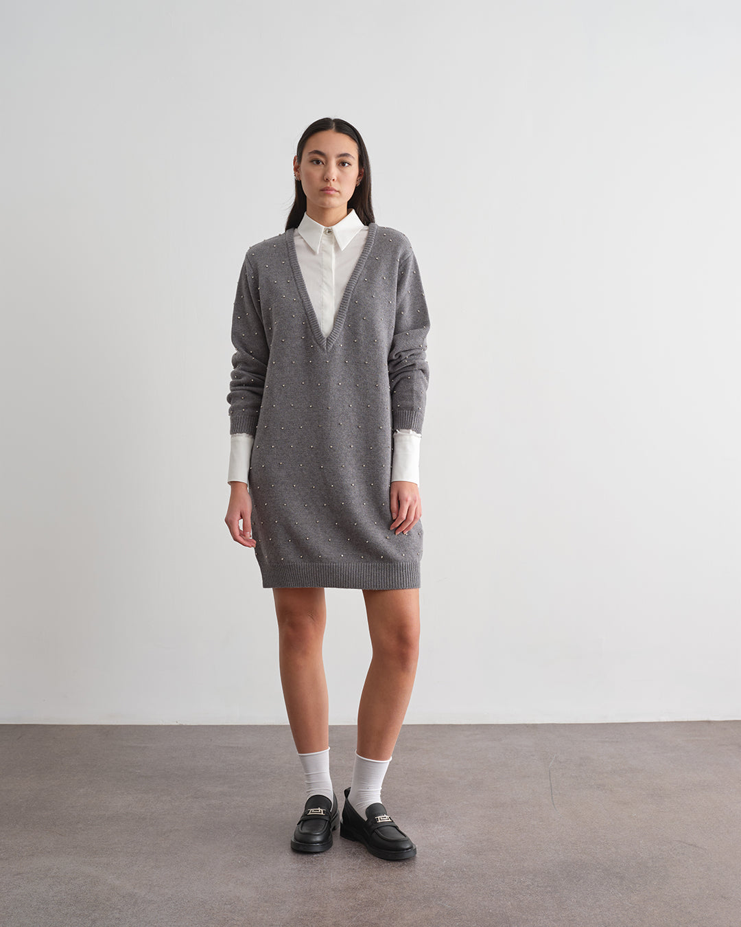 Maglione lungo con applicazioni strass